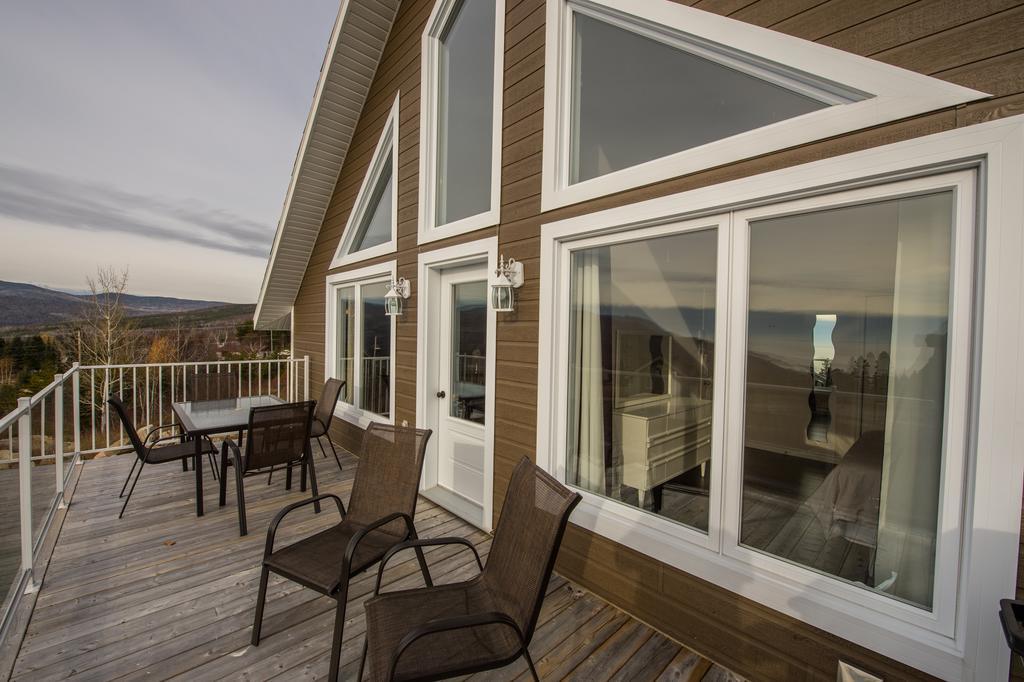 Les Chalets Huppes Du Massif Petite-Riviere-Saint-Francois Rum bild